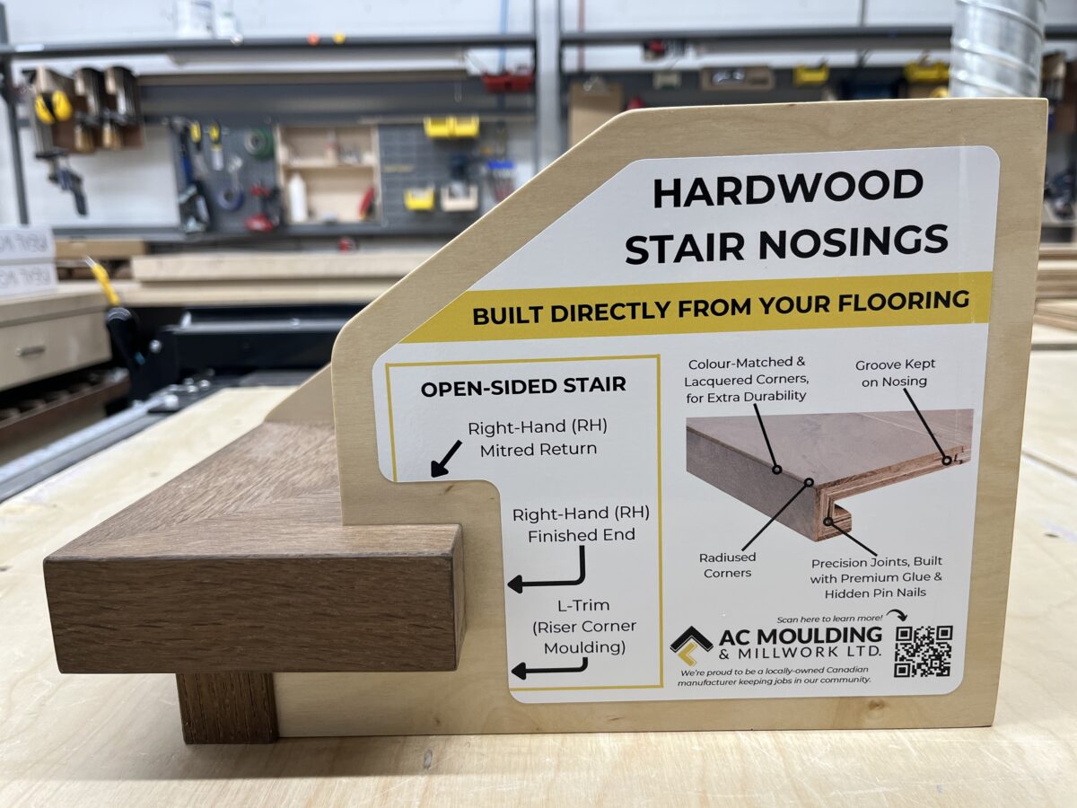 Side view of hardwood sample staircase showing open-sided nosing detail and finished returns.