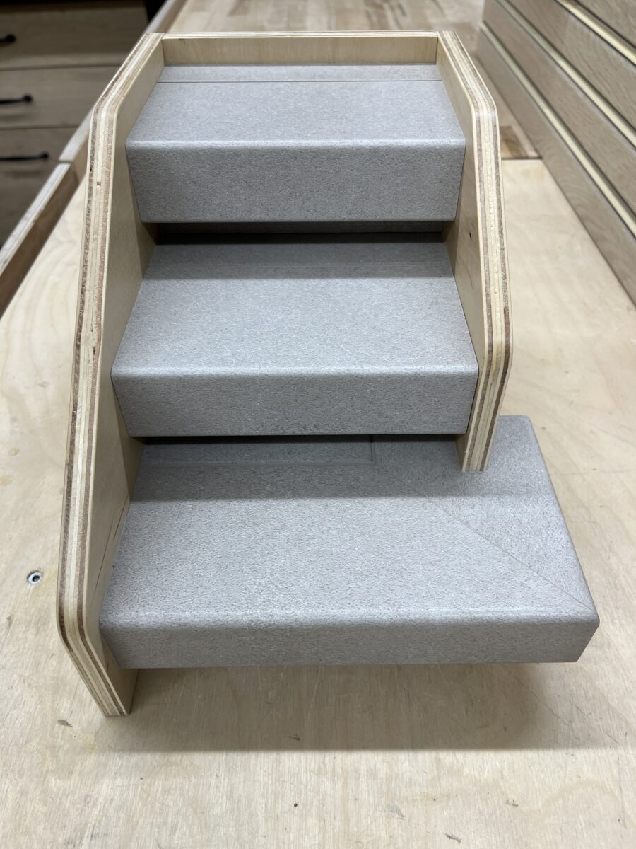 Full display view of vinyl sample staircase used for showroom and dealer presentations.